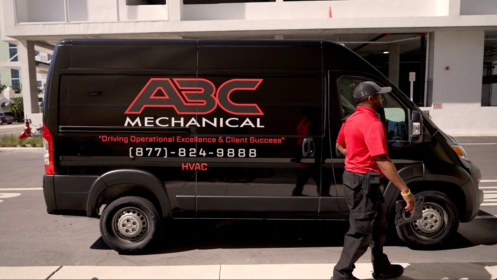 ABC Mechanical fleet vehicles, branded with red ABC mark